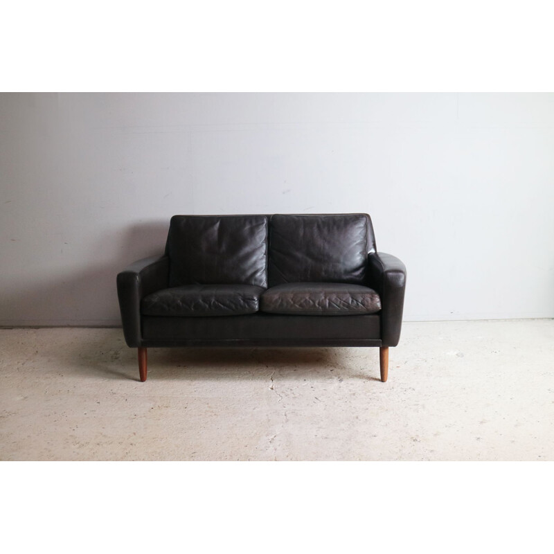 Vintage black leather Danish sofa