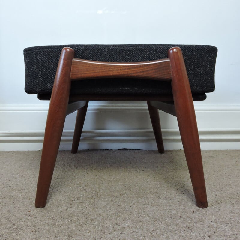 Vintage black Ottoman, made in teak and fabric, by Hans Wegner for GETAMA