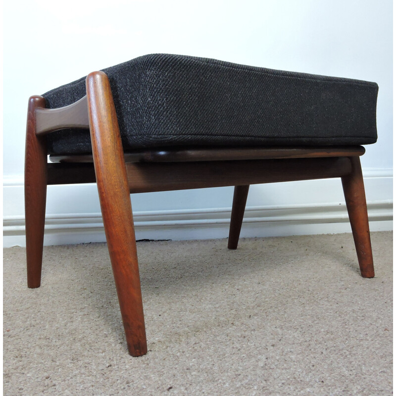 Vintage black Ottoman, made in teak and fabric, by Hans Wegner for GETAMA