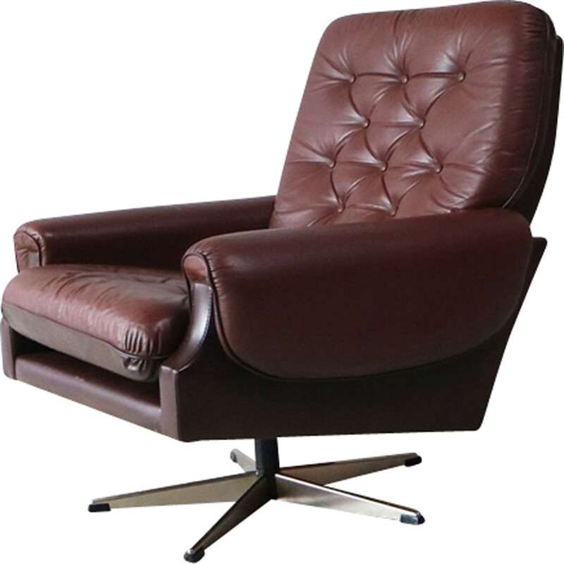 Danish swiveling armchair in brown leather