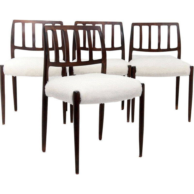 Set of 4 white chairs in teak by Niels O. Moller