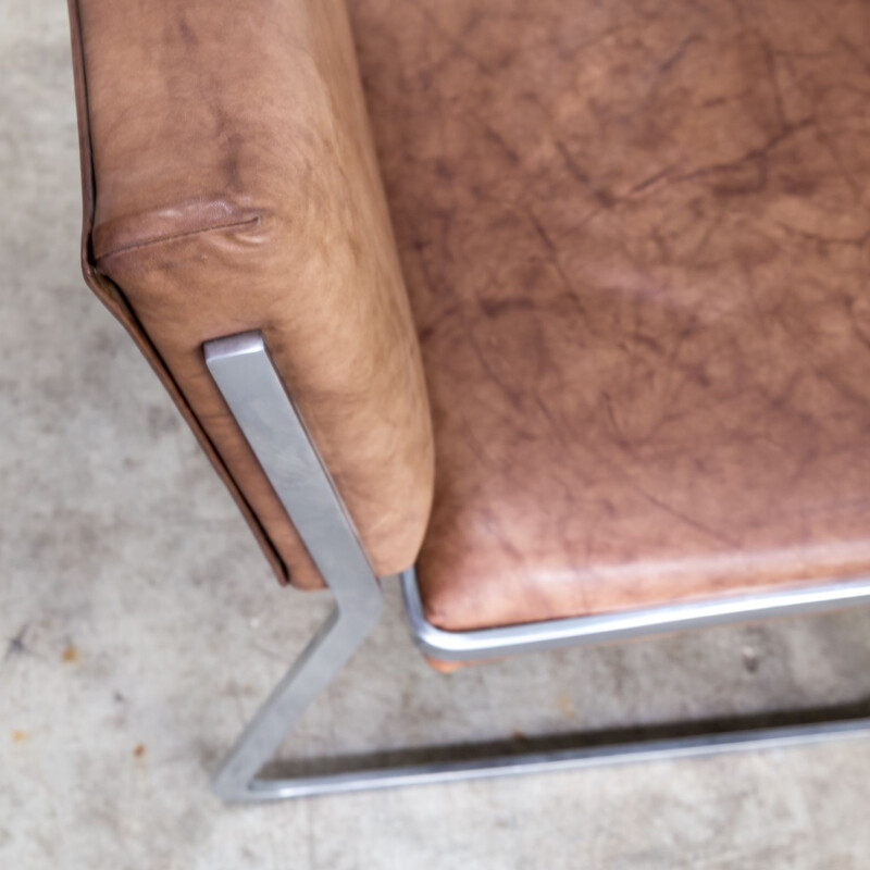 Paire de fauteuils vintage en acier et cuir par Paul Sumi pour Lübke & Rolf