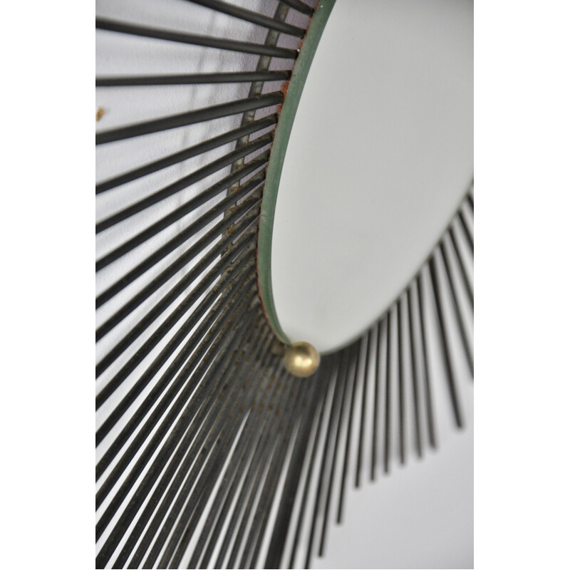 Vintage Sun mirror in black metal