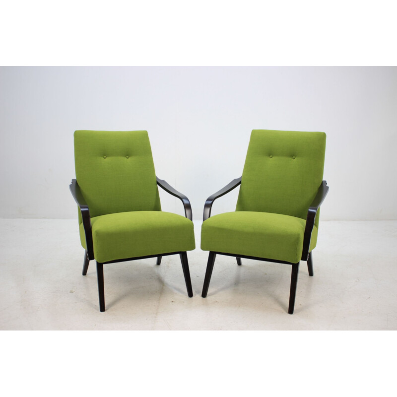 Pair of green armchairs in oakwood