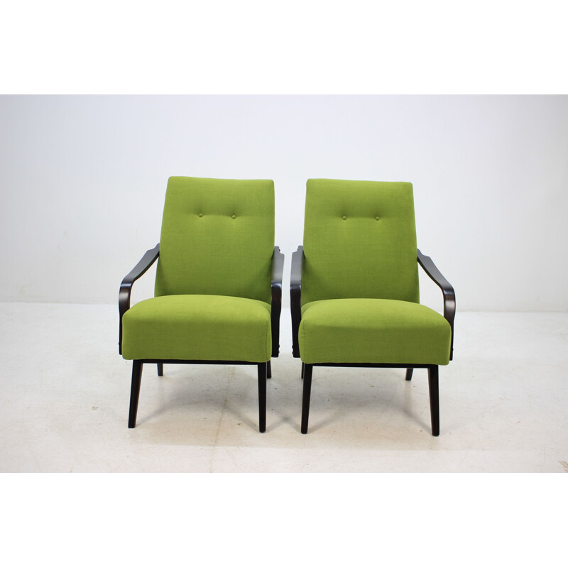 Pair of green armchairs in oakwood