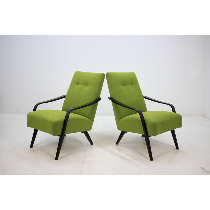 Pair of green armchairs in oakwood