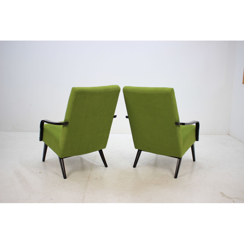 Pair of green armchairs in oakwood