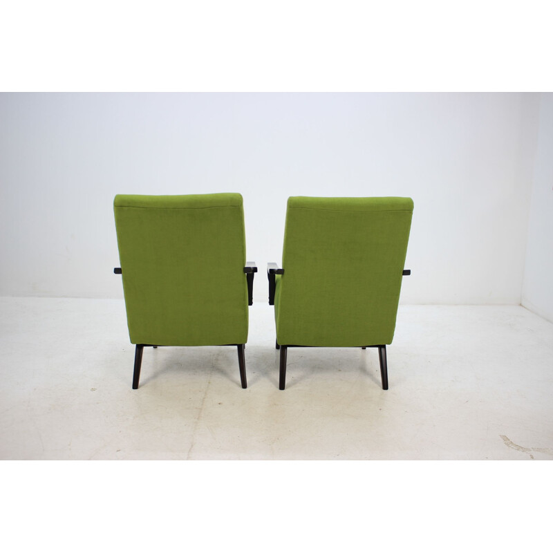 Pair of green armchairs in oakwood