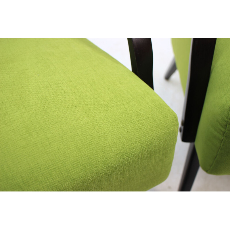Pair of green armchairs in oakwood