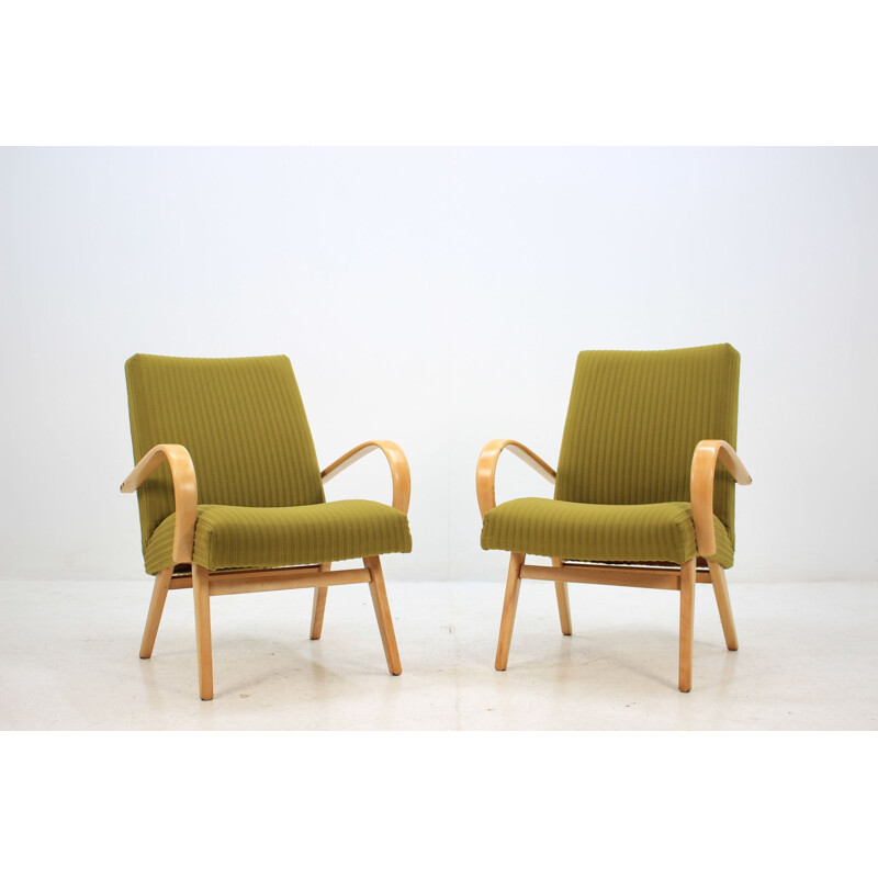 Pair of green armchairs in oakwood