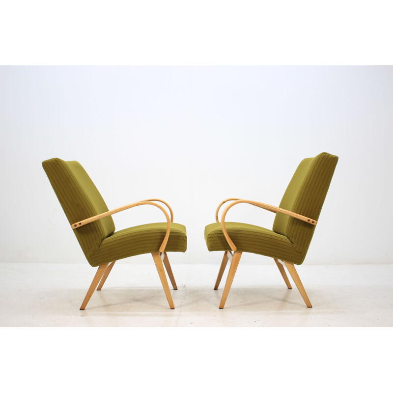 Pair of green armchairs in oakwood