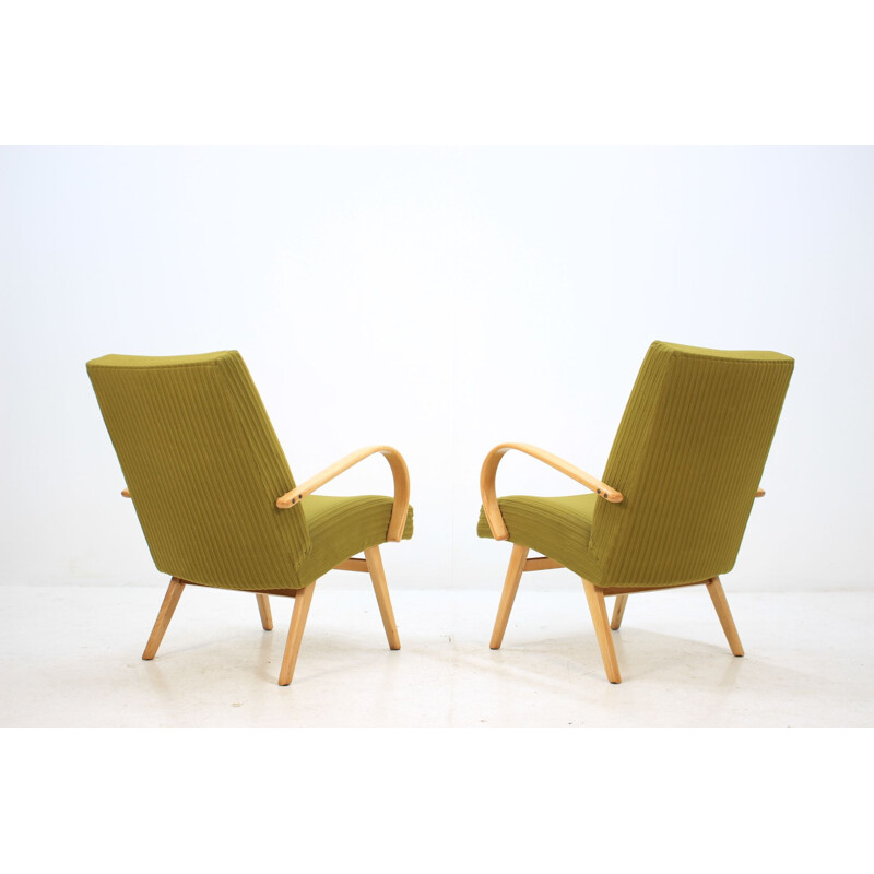 Pair of green armchairs in oakwood