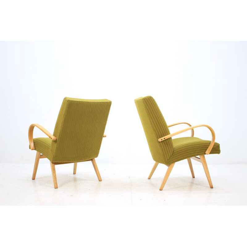 Pair of green armchairs in oakwood