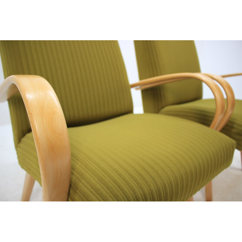 Paar groene eiken fauteuils