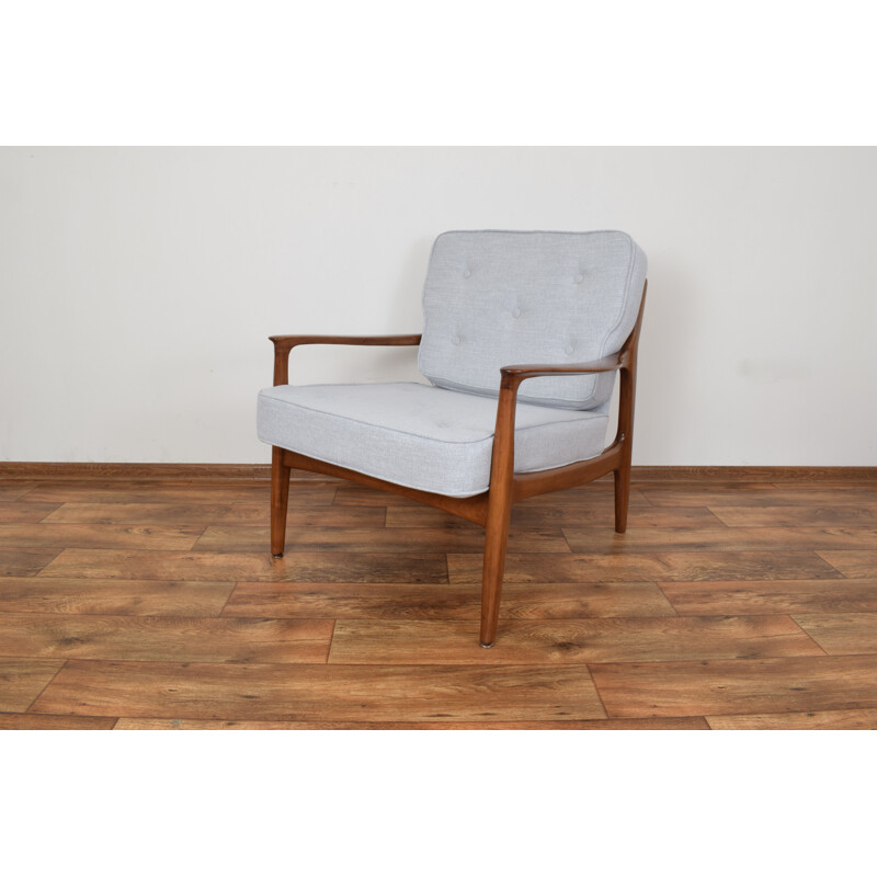Grey armchair in teak by Eugen Schmidt for Soloform