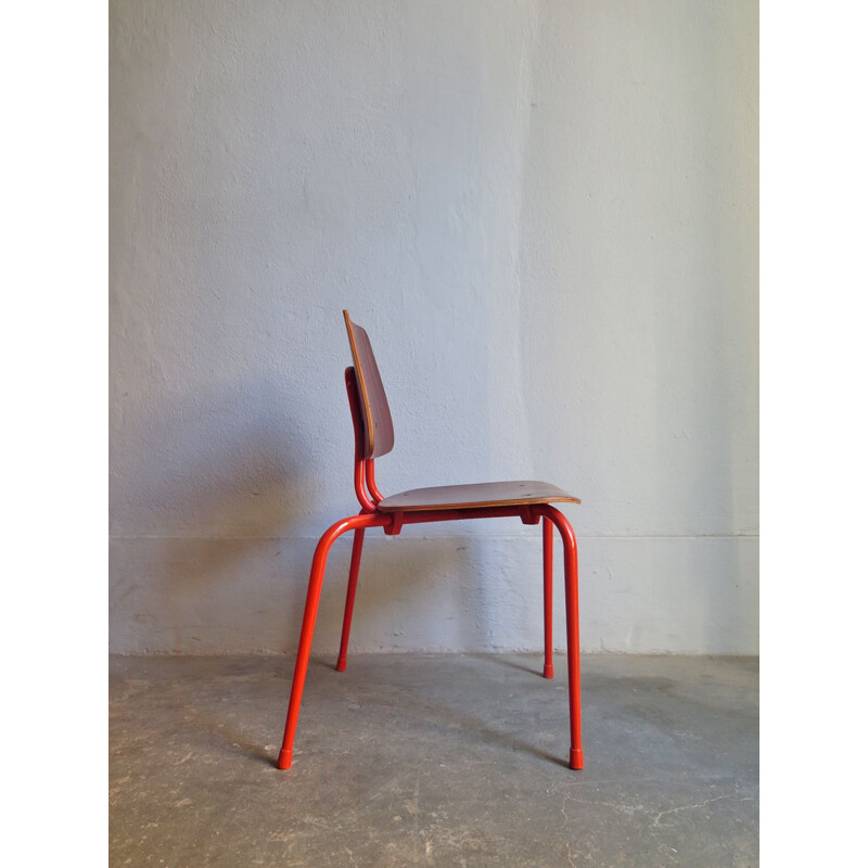 Orange children chair in metal and wood