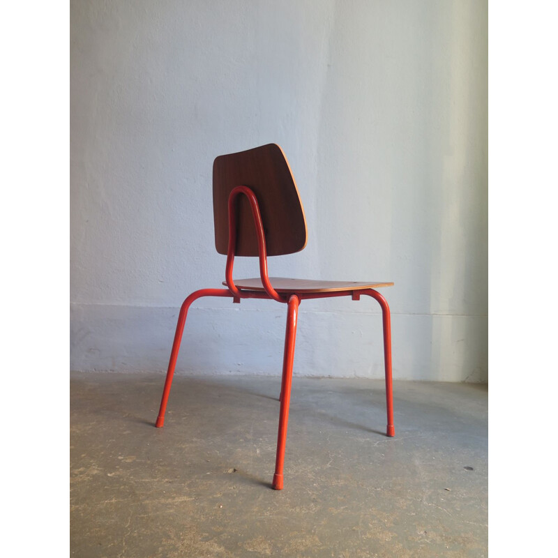 Orange children chair in metal and wood