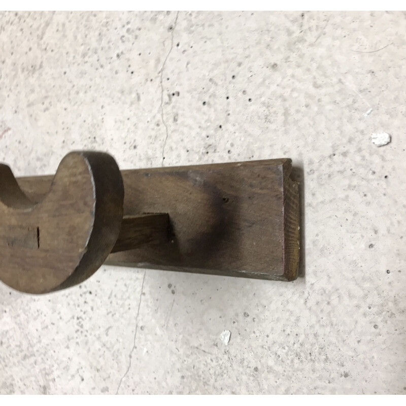 Vintage brown coat rack in wood