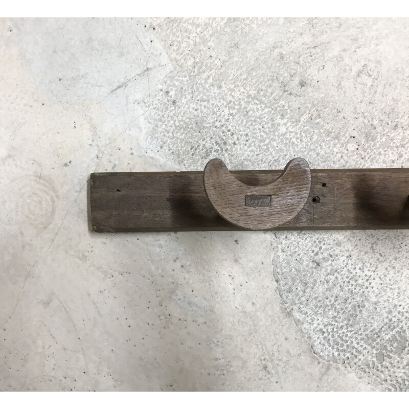 Vintage brown coat rack in wood