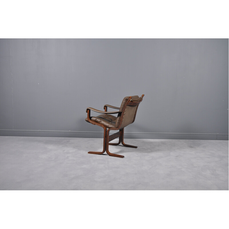 Vintage Siesta armchair in beechwood and brown leather 1960