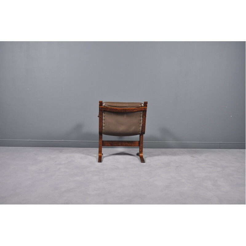 Vintage Siesta armchair in beechwood and brown leather 1960