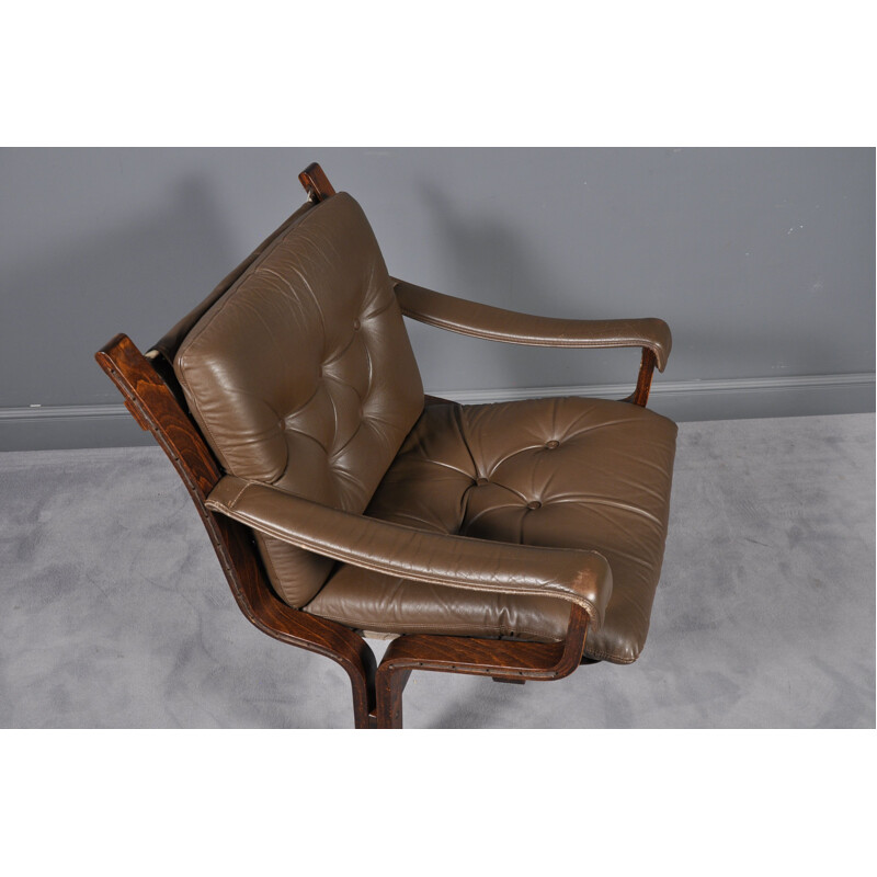 Vintage Siesta armchair in beechwood and brown leather 1960