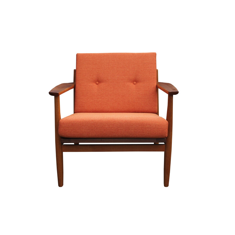 Vintage orange armchair in teak