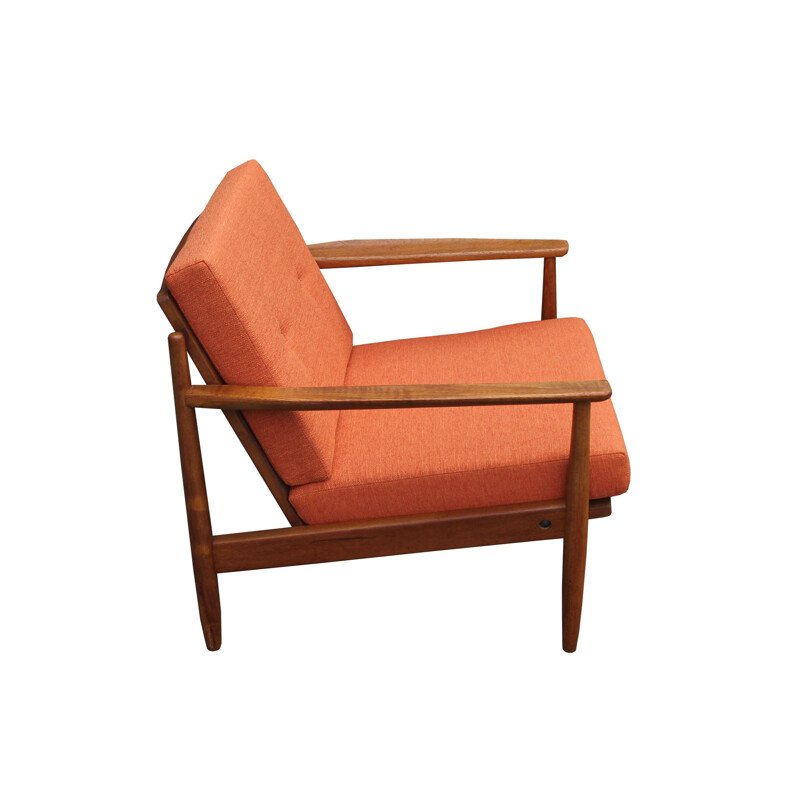 Vintage orange armchair in teak