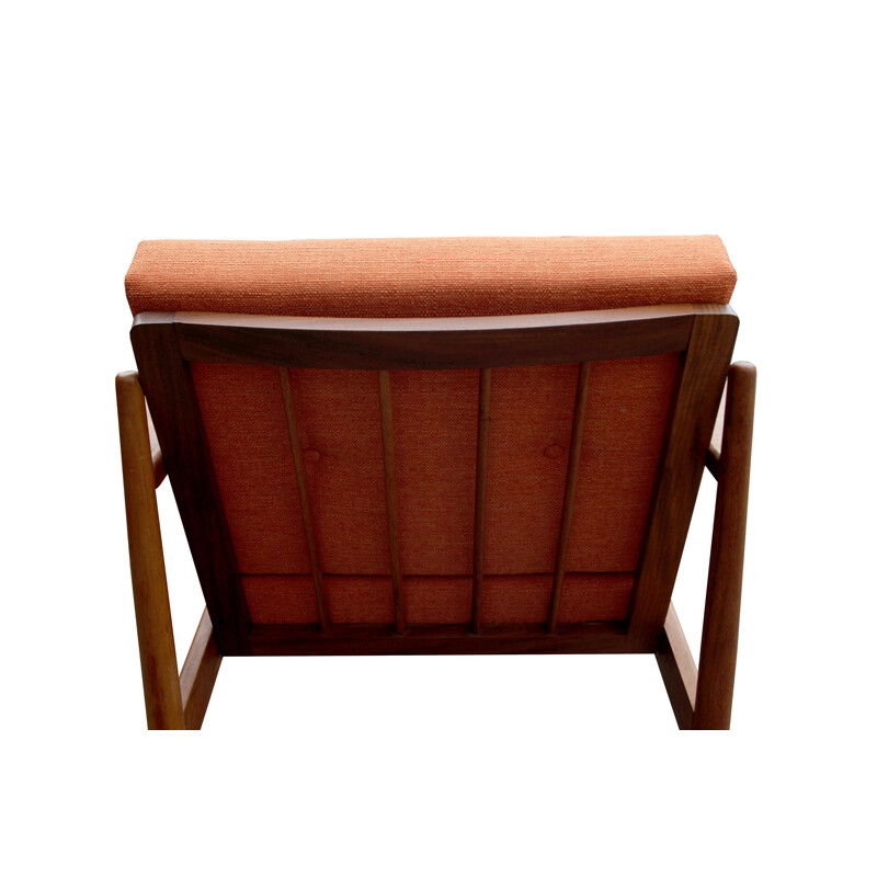 Vintage orange armchair in teak