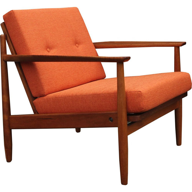 Vintage orange armchair in teak