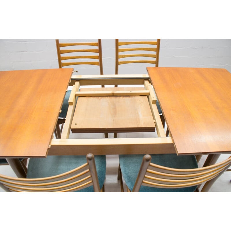 Set of vintage extendable teak table and 7 chairs 1960s