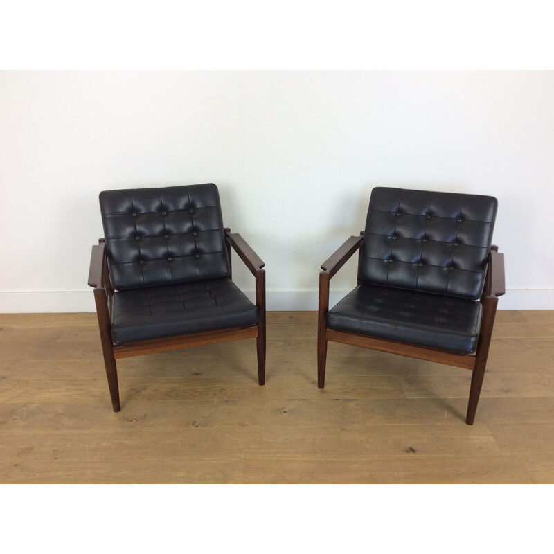 Pair of black rosewood armchairs by Borge Jensen