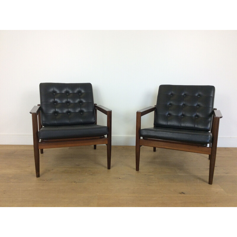 Pair of black rosewood armchairs by Borge Jensen