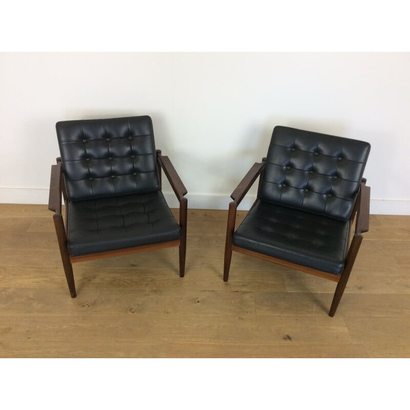 Pair of black rosewood armchairs by Borge Jensen