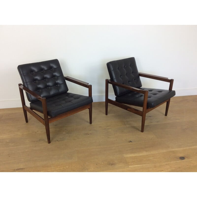 Pair of black rosewood armchairs by Borge Jensen