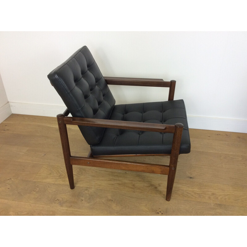 Pair of black rosewood armchairs by Borge Jensen