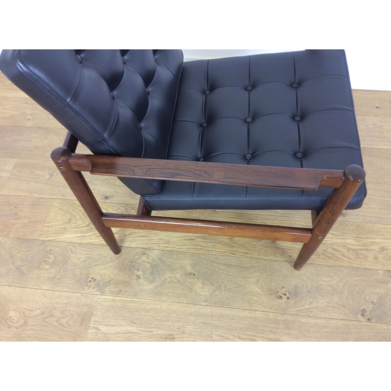 Pair of black rosewood armchairs by Borge Jensen