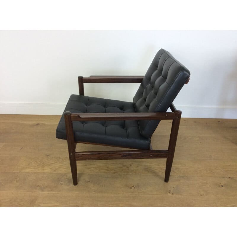 Pair of black rosewood armchairs by Borge Jensen