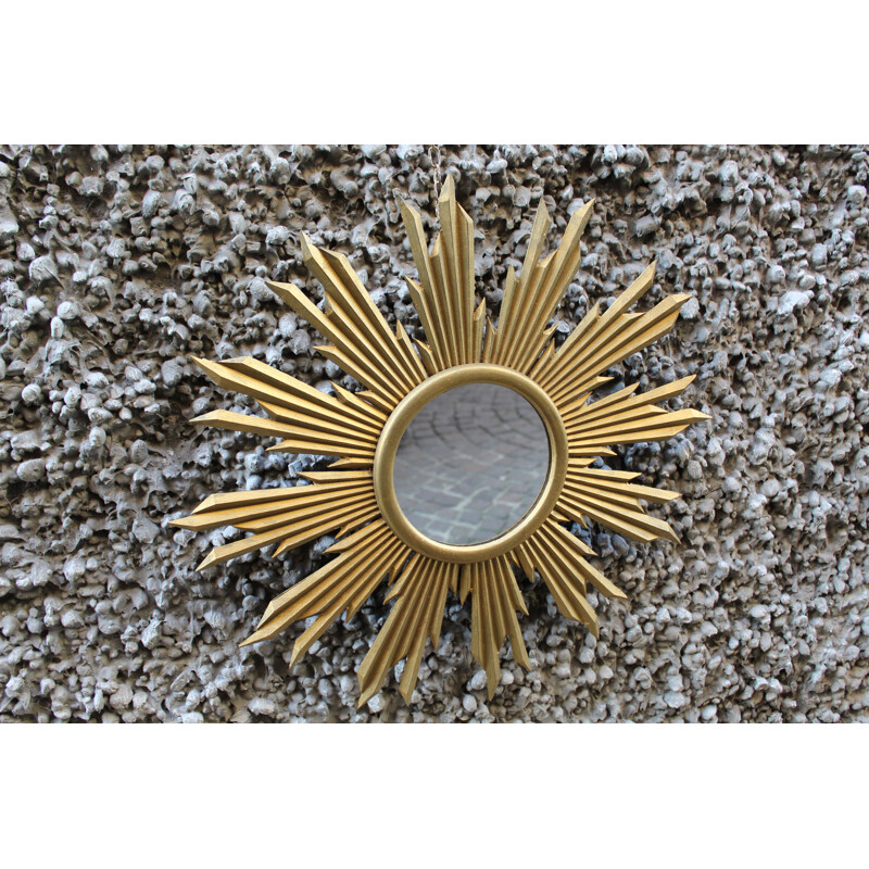 Vintage Sun mirror in golden glass