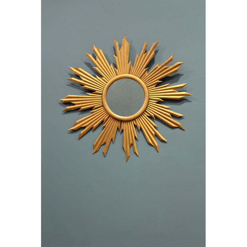 Vintage Sun mirror in golden glass