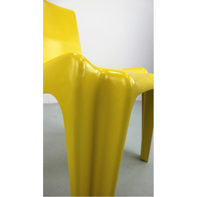 Yellow chair in fiberglass by Helmut Bätzner