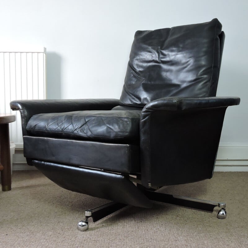 Fauteuil pivotant vintage en cuir noir 1960