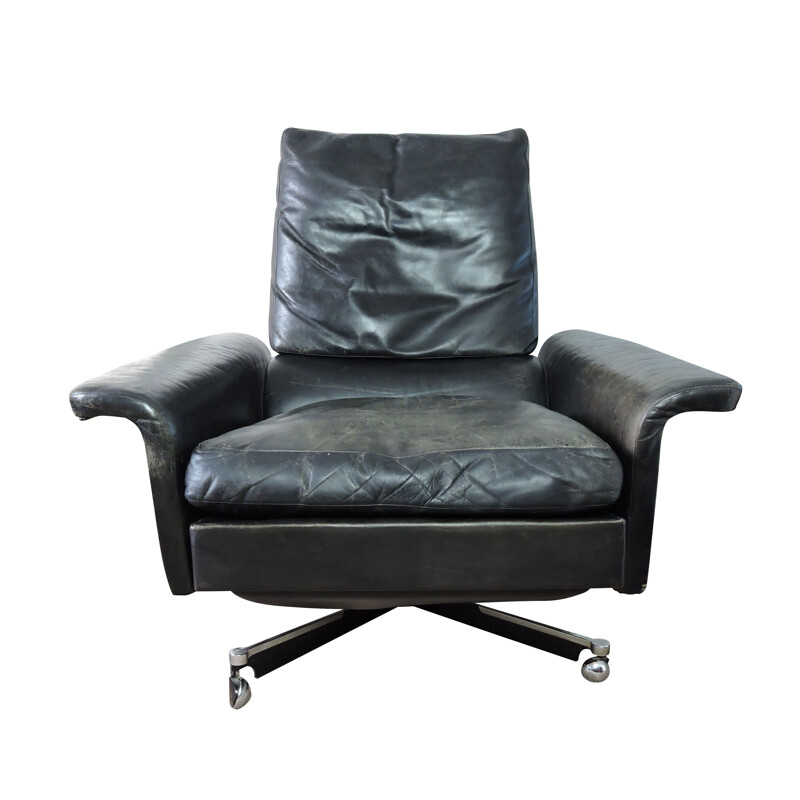 Vintage black leather swivelling armchair 1960