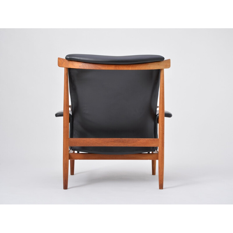 Fauteuil Danois noir retapissé Bwana modèle 152 de Finn Juhl pour France & Son