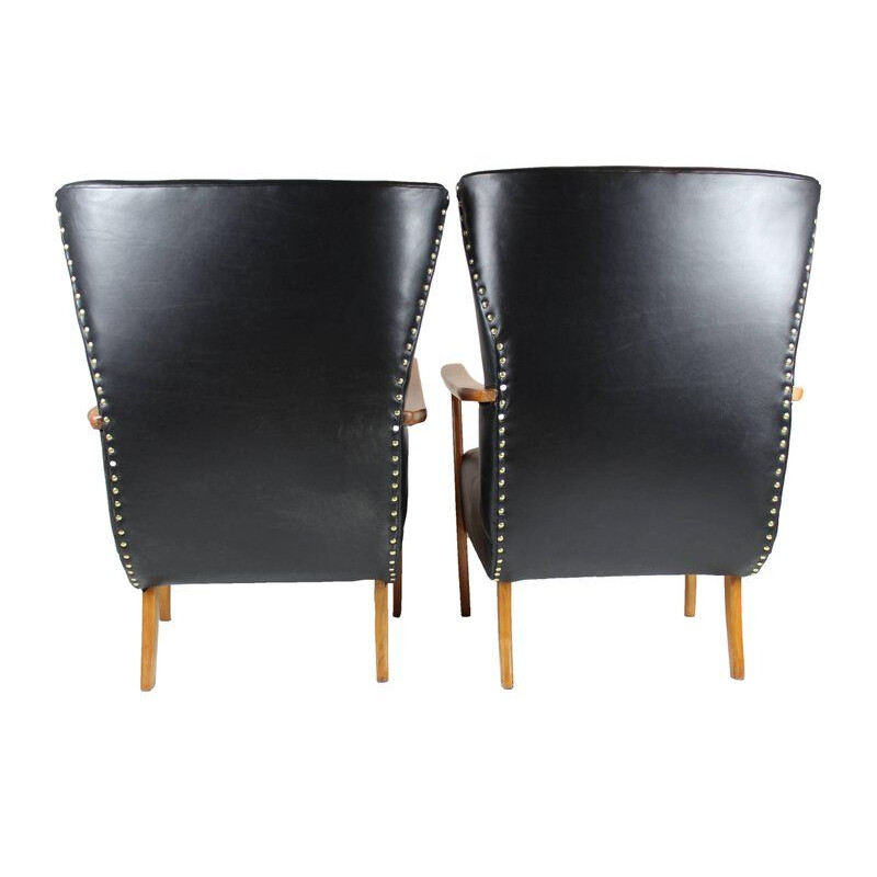 Pair of vintage italian armchairs in black leather 1950