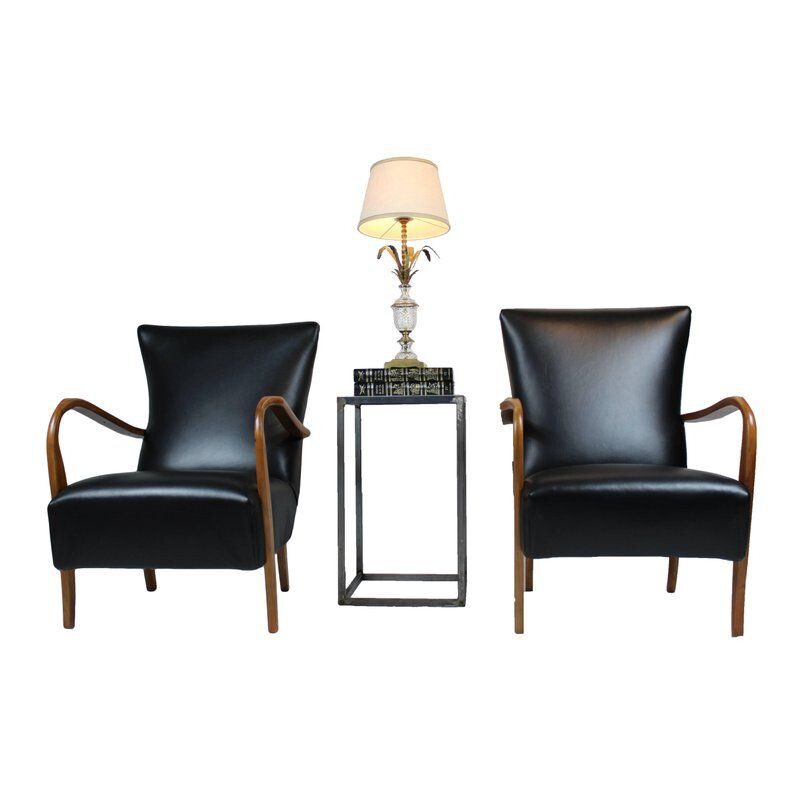 Pair of vintage italian armchairs in black leather 1950