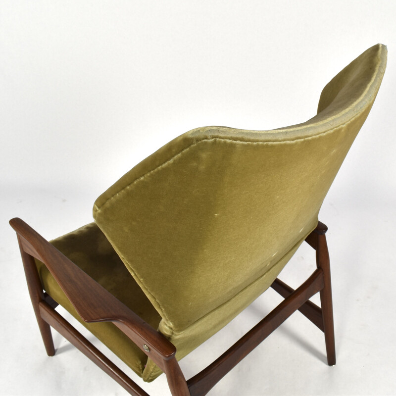 Vintage wingback armchair for Carlo Garhn in teak and green velvet 1960