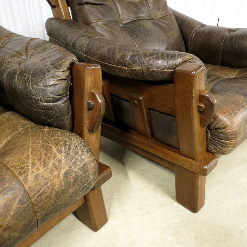 Suite de 2 fauteuils vintage en cuir brutaliste