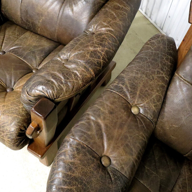Suite de 2 fauteuils vintage en cuir brutaliste