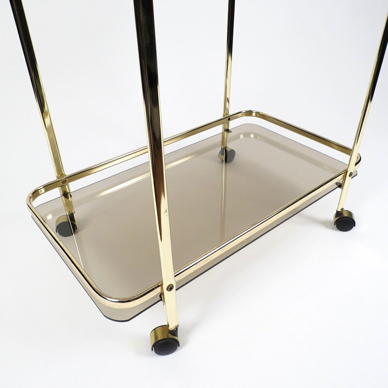 Vintage gilt metal and smoked glass serving trolley